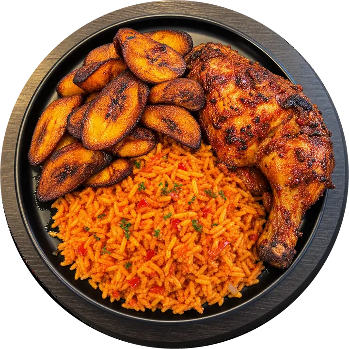 Jollof rice with fried plantain and grilled chicken